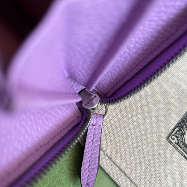GUCCI Leather zip around wallet