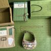 GUCCI Half-moon-shaped mini bag with Interlocking G