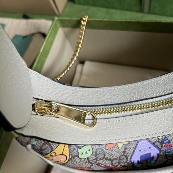 GUCCI Half-moon-shaped mini bag with Interlocking G