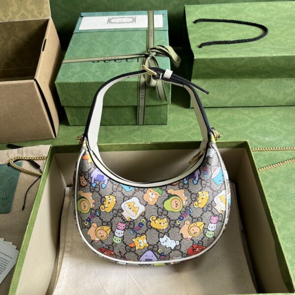 GUCCI Half-moon-shaped mini bag with Interlocking G