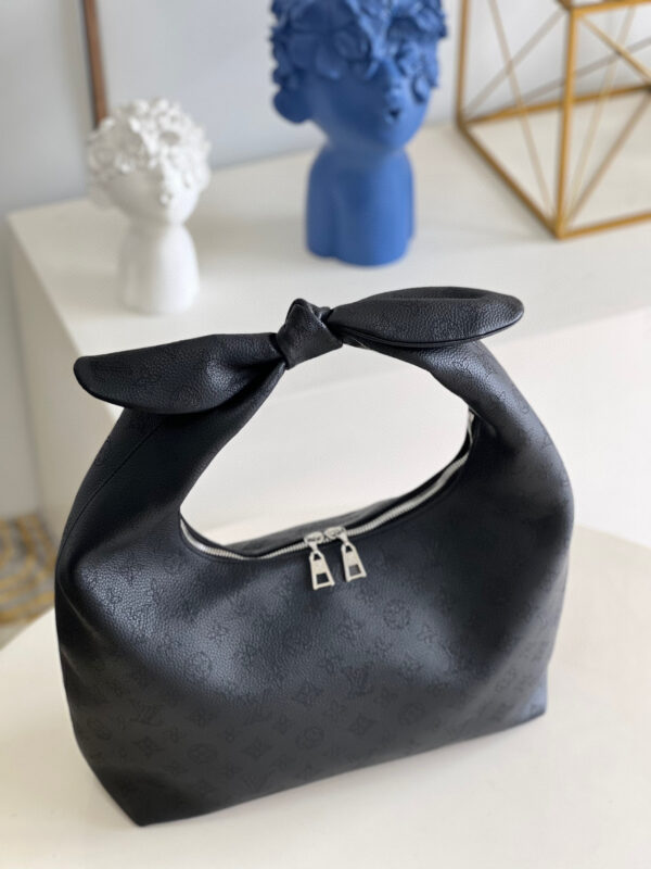 Louis Vuitton Why Knot MM