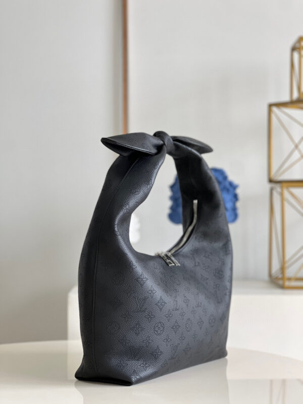 Louis Vuitton Why Knot MM