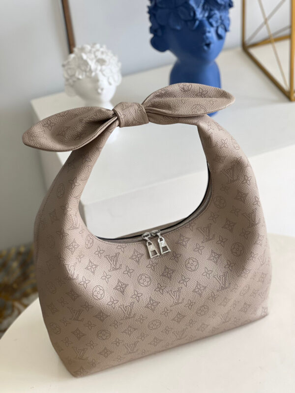 Louis Vuitton Why Knot MM