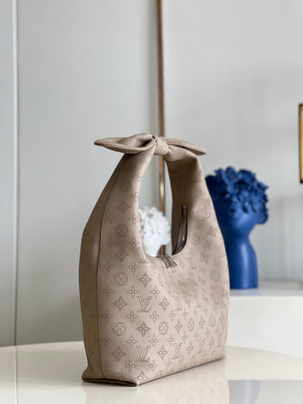 Louis Vuitton Why Knot MM