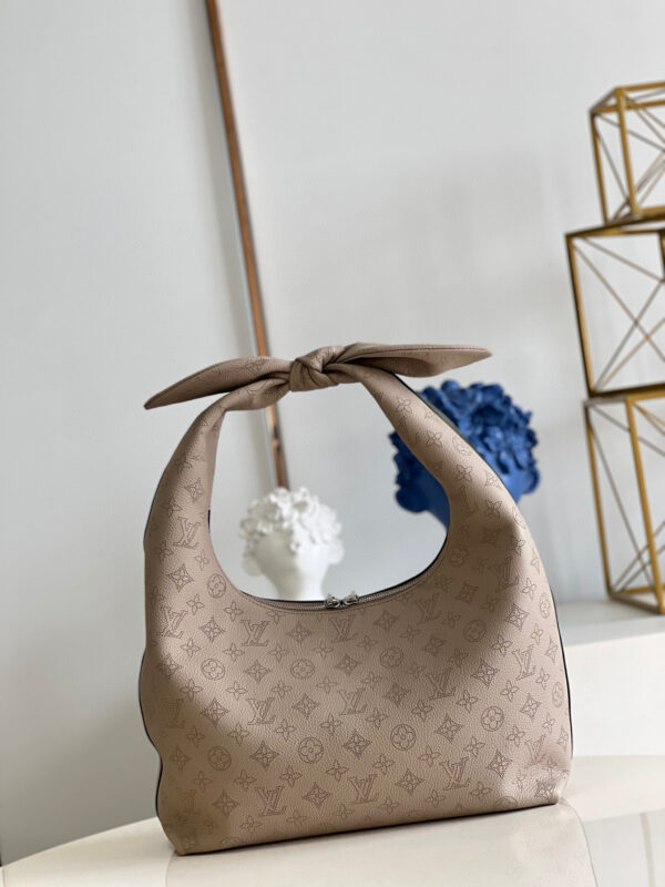 Louis Vuitton Why Knot MM