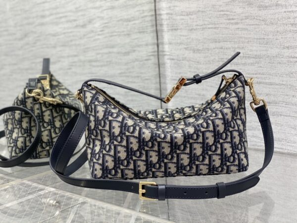 MEDIUM DIORTRAVEL NOMAD POUCH