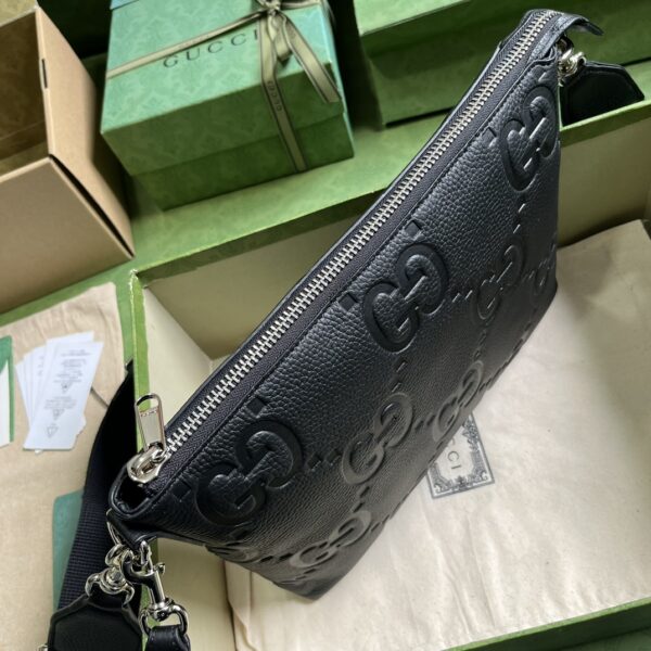 Gucci GG EMBOSSED MEDIUM MESSENGER BAG