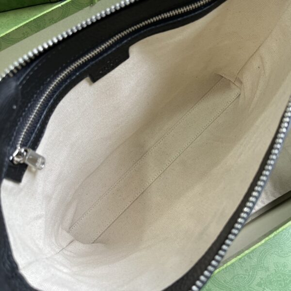 Gucci GG EMBOSSED MEDIUM MESSENGER BAG