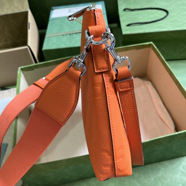 Gucci GG EMBOSSED MEDIUM MESSENGER BAG