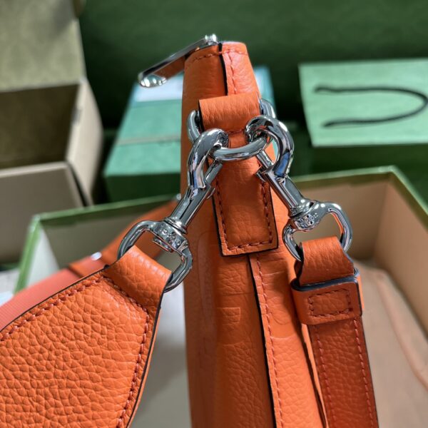 Gucci GG EMBOSSED MEDIUM MESSENGER BAG
