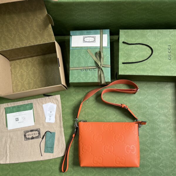 Gucci GG EMBOSSED MEDIUM MESSENGER BAG
