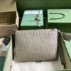 Gucci GG EMBOSSED MEDIUM MESSENGER BAG