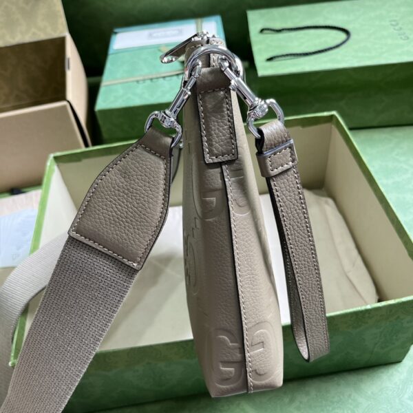 Gucci GG EMBOSSED MEDIUM MESSENGER BAG