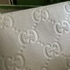 Gucci GG EMBOSSED MEDIUM MESSENGER BAG