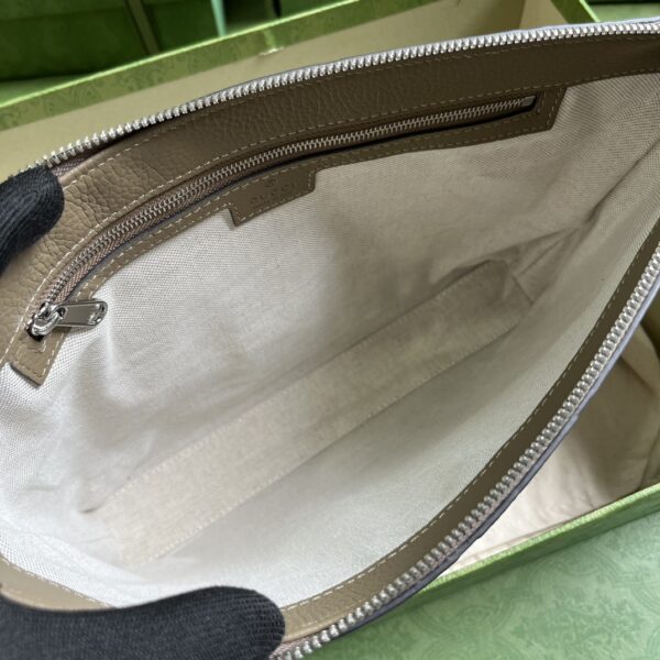 Gucci GG EMBOSSED MEDIUM MESSENGER BAG