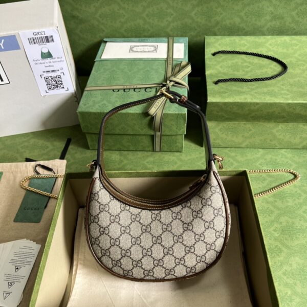 GUCCI Half-moon-shaped mini bag with Interlocking G
