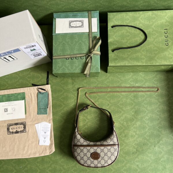 GUCCI Half-moon-shaped mini bag with Interlocking G