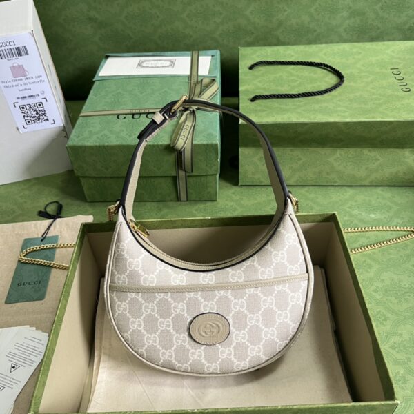 GUCCI Half-moon-shaped mini bag with Interlocking G