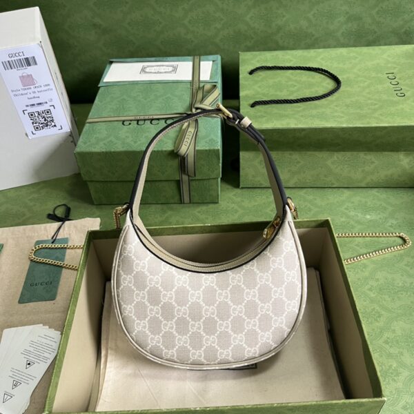 GUCCI Half-moon-shaped mini bag with Interlocking G