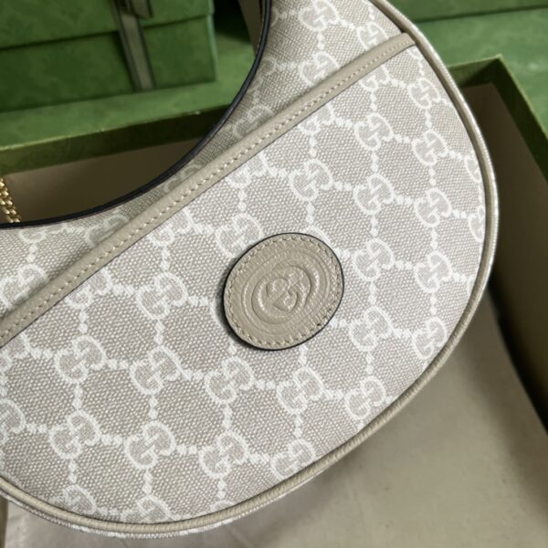 GUCCI Half-moon-shaped mini bag with Interlocking G