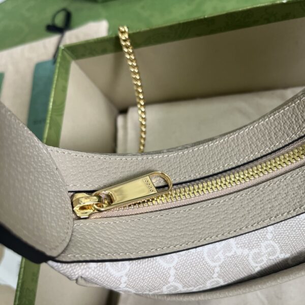 GUCCI Half-moon-shaped mini bag with Interlocking G