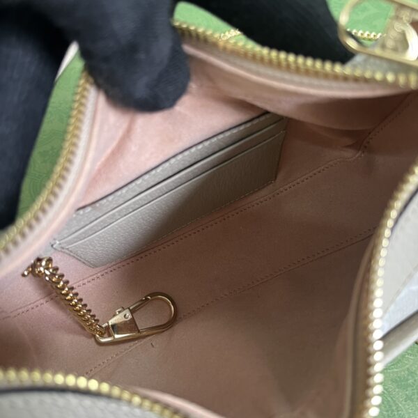 GUCCI Half-moon-shaped mini bag with Interlocking G