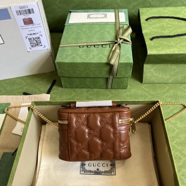 Gucci GG MATELASSÉ TOP HANDLE MINI BAG