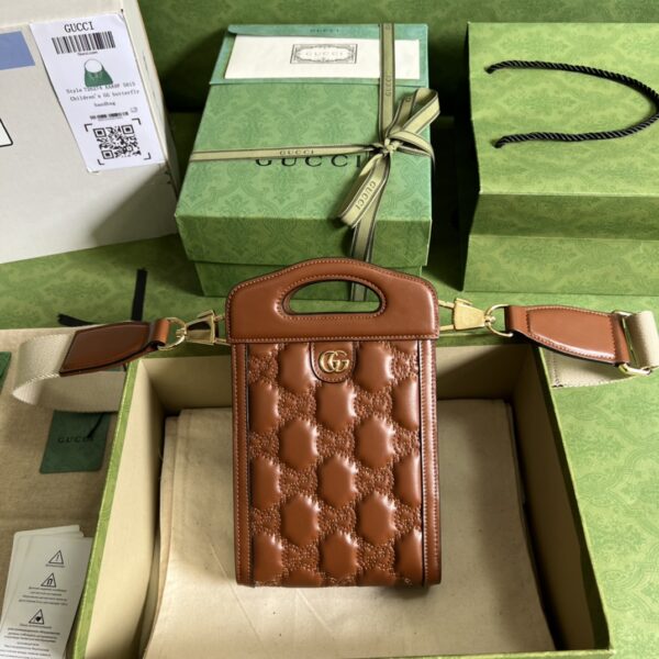 Gucci GG MATELASSÉ TOP HANDLE MINI BAG