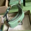 Gucci Marmont half-moon-shaped mini bag