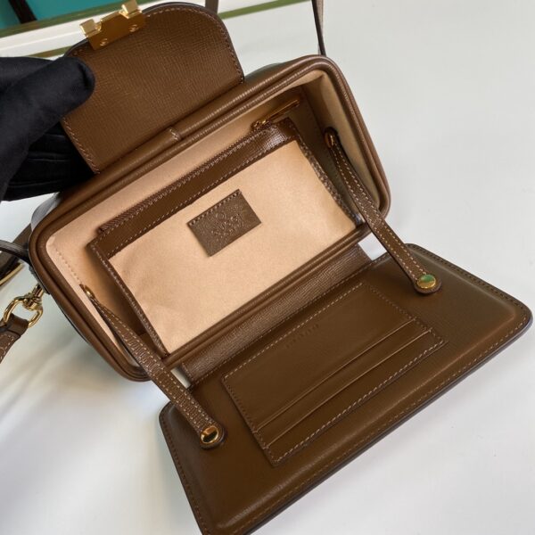 Gucci GG mini bag with clasp closure