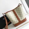 CELINE SMALL BUCKET IN TRIOMPHE CANVAS AND CALFSKIN