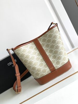 CELINE SMALL BUCKET IN TRIOMPHE CANVAS AND CALFSKIN
