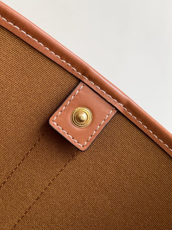 CELINE SMALL BUCKET IN TRIOMPHE CANVAS AND CALFSKIN