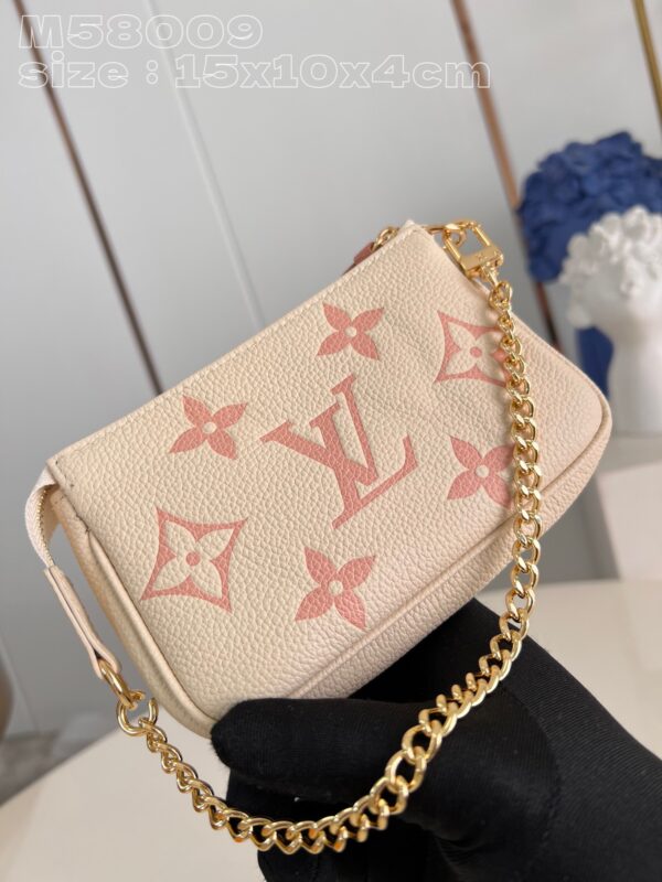Louis Vuitton Mini Pochette Accessoires Handbag