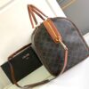 CELINE LARGE TRAVEL BAG IN TRIOMPHE CANVAS
