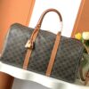 CELINE LARGE TRAVEL BAG IN TRIOMPHE CANVAS