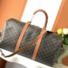 CELINE LARGE TRAVEL BAG IN TRIOMPHE CANVAS