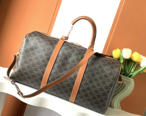 CELINE LARGE TRAVEL BAG IN TRIOMPHE CANVAS