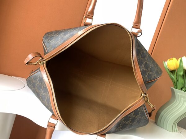 CELINE LARGE TRAVEL BAG IN TRIOMPHE CANVAS