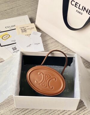 CELINE Oval minaudiere cuir triomphe
