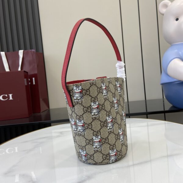 GUCCI CHILDREN’S PRINTED GG BUCKET BAG