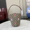 GUCCI CHILDREN’S PRINTED GG BUCKET BAG