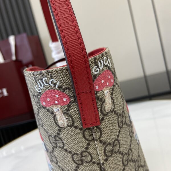 GUCCI CHILDREN’S PRINTED GG BUCKET BAG