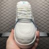 White and blue low-top casual sneakers