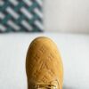 Wheat colored letter ankle boots