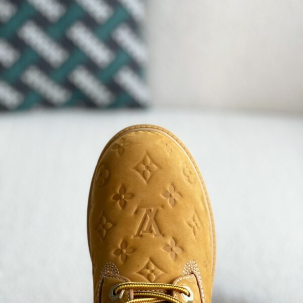 Wheat colored letter ankle boots