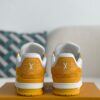 Yellow denim and white sneakers