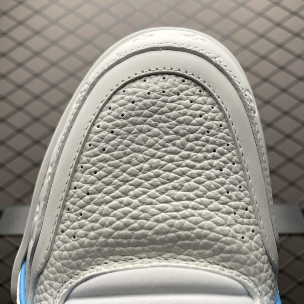 White and blue low-top casual sneakers