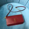 YSL CASSANDRE PHONE HOLDER WITH STRAP