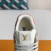 White and orange sneakers